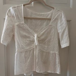 Short sleeve eyelet top
